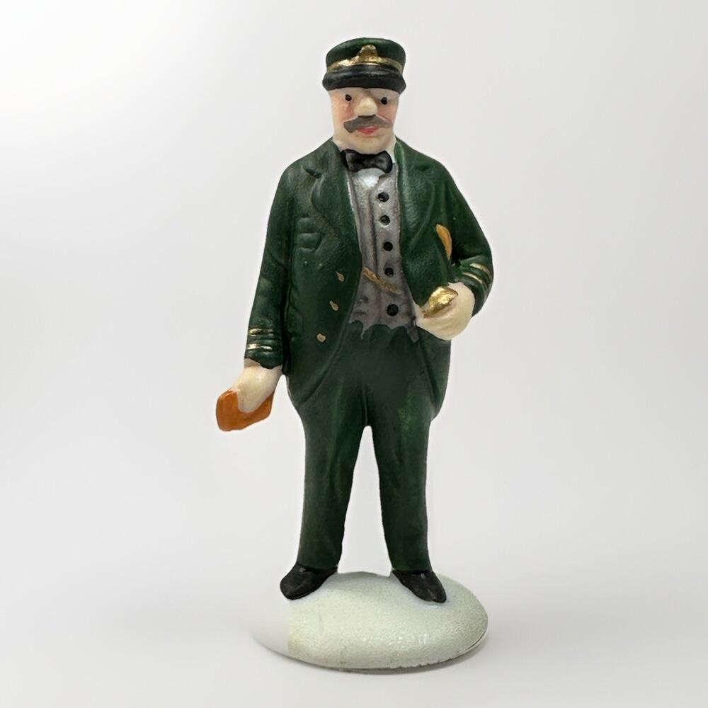 Department 56 Heritage Village “Holiday Travelers” 55719 • Gentleman Figurine